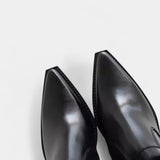 Дамски кожени ботуши до глезена с цип отстрани