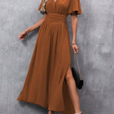 Eterna | Elegáns Fekete Maxi Ruha V Kivágással, Laza Ujjakkal és Hasítékkal