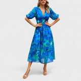 Clara – Elegáns Midi Virágmintás Ruha