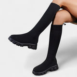 Женски ботуши до коляното с еластичен материал и закръглен нос с нисък блоков ток