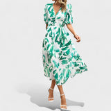 Clara – Elegáns Midi Virágmintás Ruha