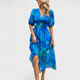 Clara – Elegáns Midi Virágmintás Ruha